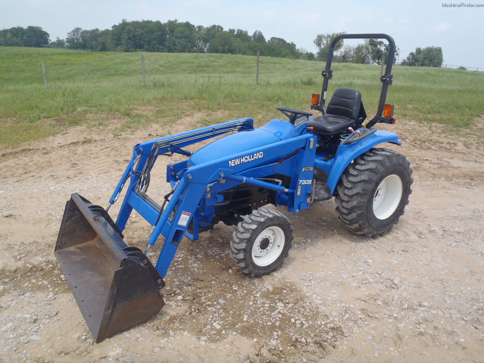 1998-new-holland-tc33-tractors-compact-1-40hp-john-deere